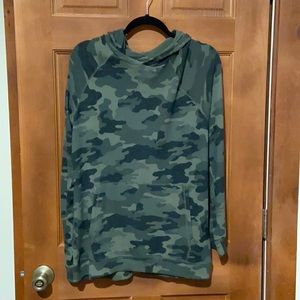 Woman’s camouflage sweatshirt with hoodie.